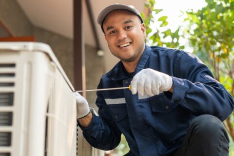 Man doing a HVAC Maintenance before Winter in Utah